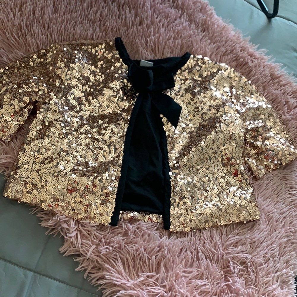 Gold sequence jacket.